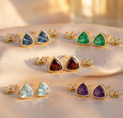 Gold stud earrings with deep blue kyanite gemstone minimalist design