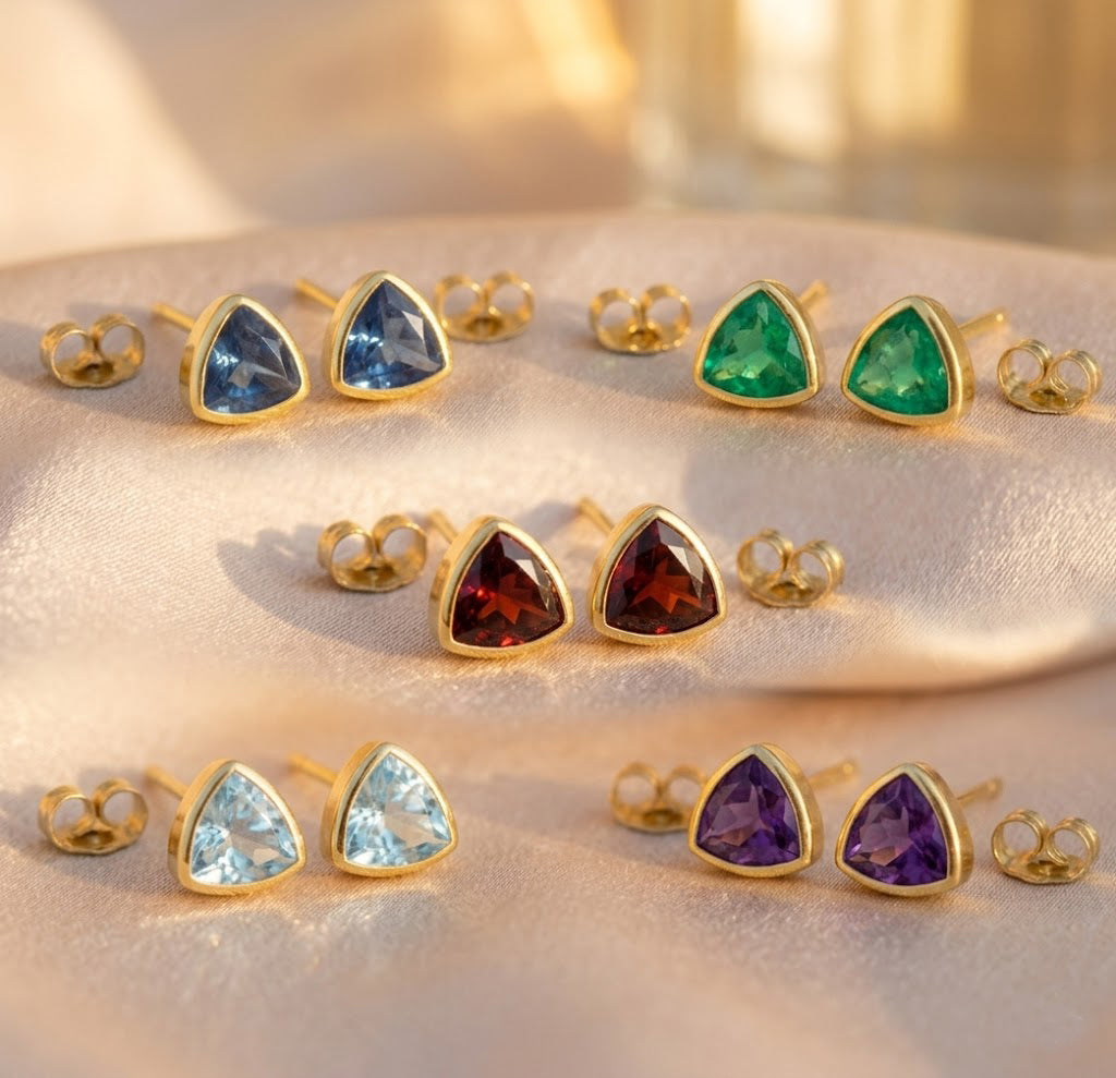 Gold stud earrings with deep blue kyanite gemstone minimalist design