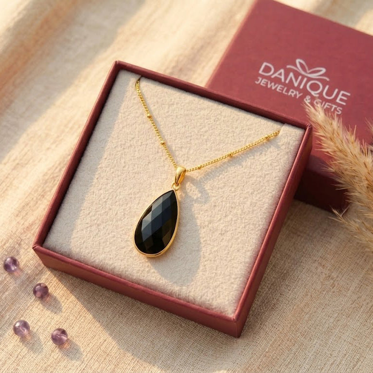 Black Onyx pendant necklace presented in Danique Jewelry