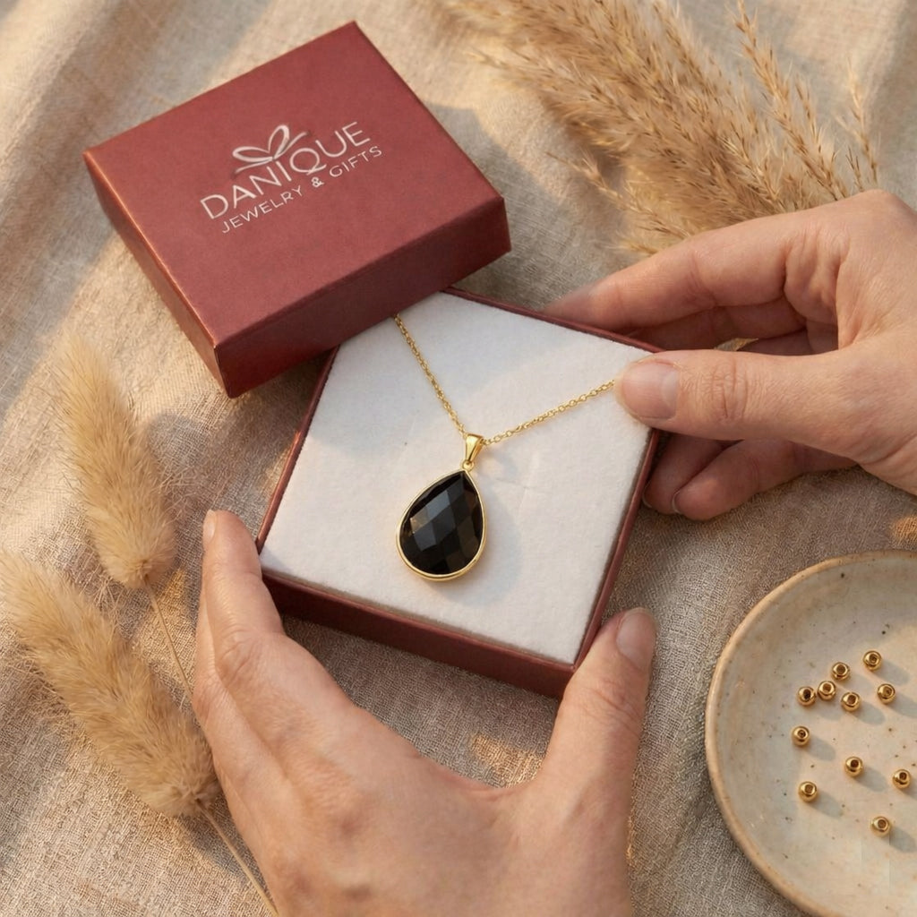 Black onyx necklace gift box packaging with Danique Jewelry presentation, dainty black gemstone pendant necklace ready for gifting, elegant gold vermeil onyx jewelry for women, gift for her, birthday gift, anniversary necklace, bridesmaid jewelry, holiday gift idea, minimalist black stone necklace beautifully packaged for special occasions
