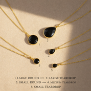 Black onyx necklace shape guide showing large round large teardrop small round medium teardrop and small teardrop pendant styles, dainty black gemstone necklace comparison, minimalist onyx jewelry for women, gold vermeil pendant necklace options, elegant black stone jewelry, gift guide for choosing the perfect everyday necklace shape and size