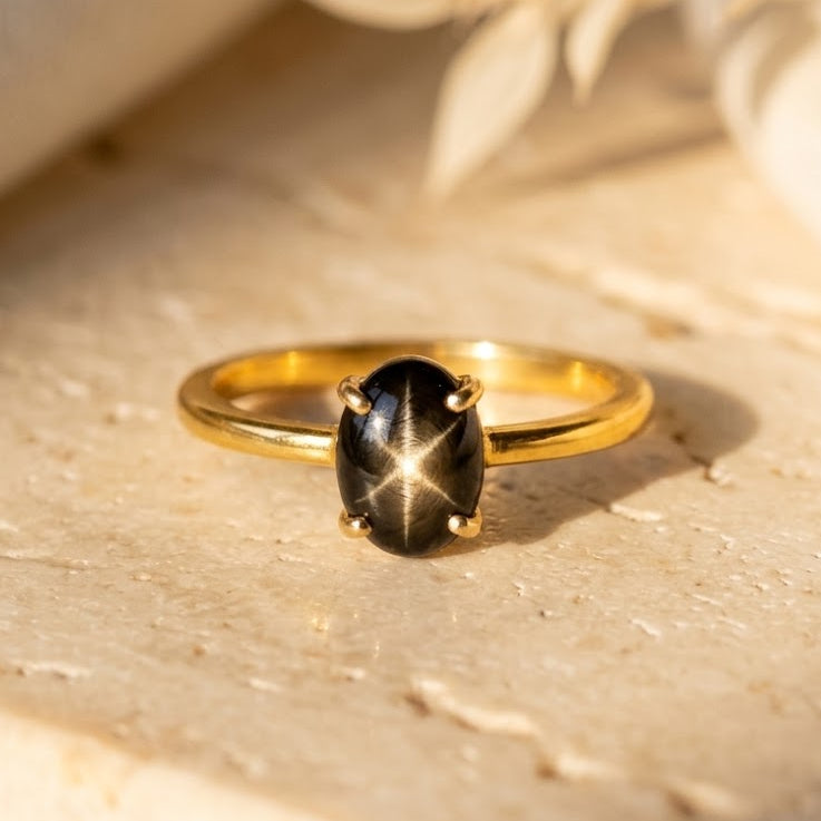 Natural oval Black Star Sapphire prong-set ring in 18K yellow gold vermeil