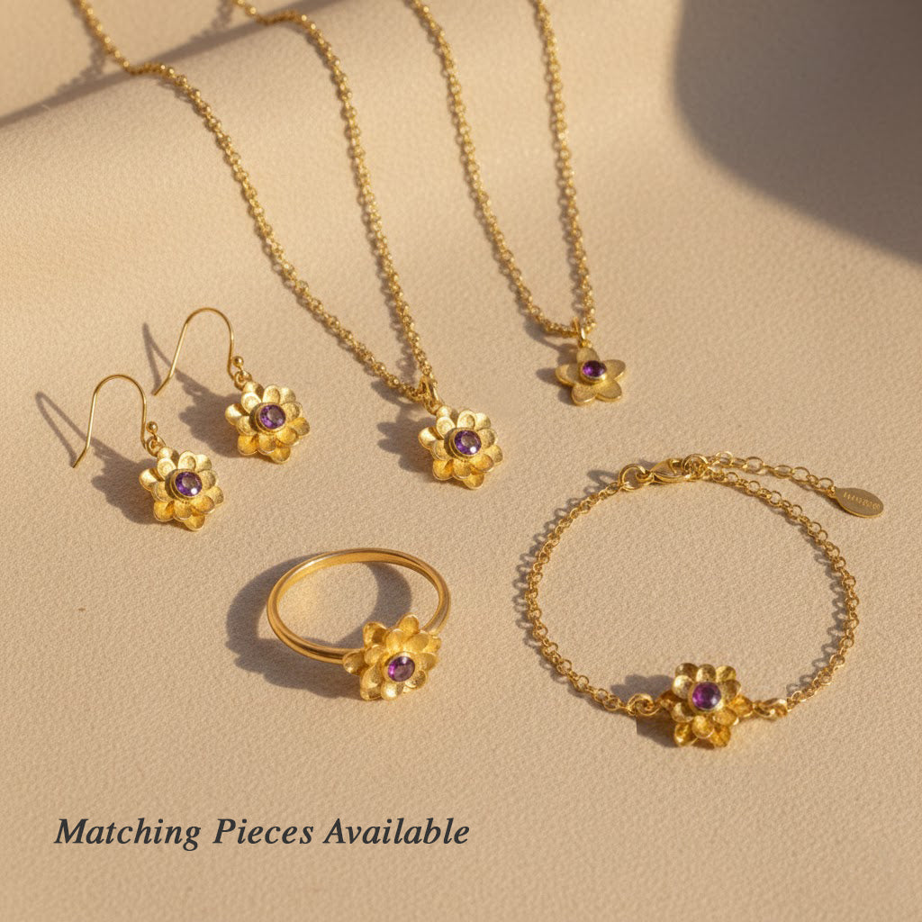 Matching jewelry set with custom birthstone flower bracelet, necklace, earrings and ring in gold