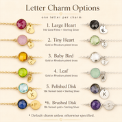 Letter charm options chart showing initial disc, heart, baby bird, leaf, brushed disc, and shield disc charms for personalized jewelry