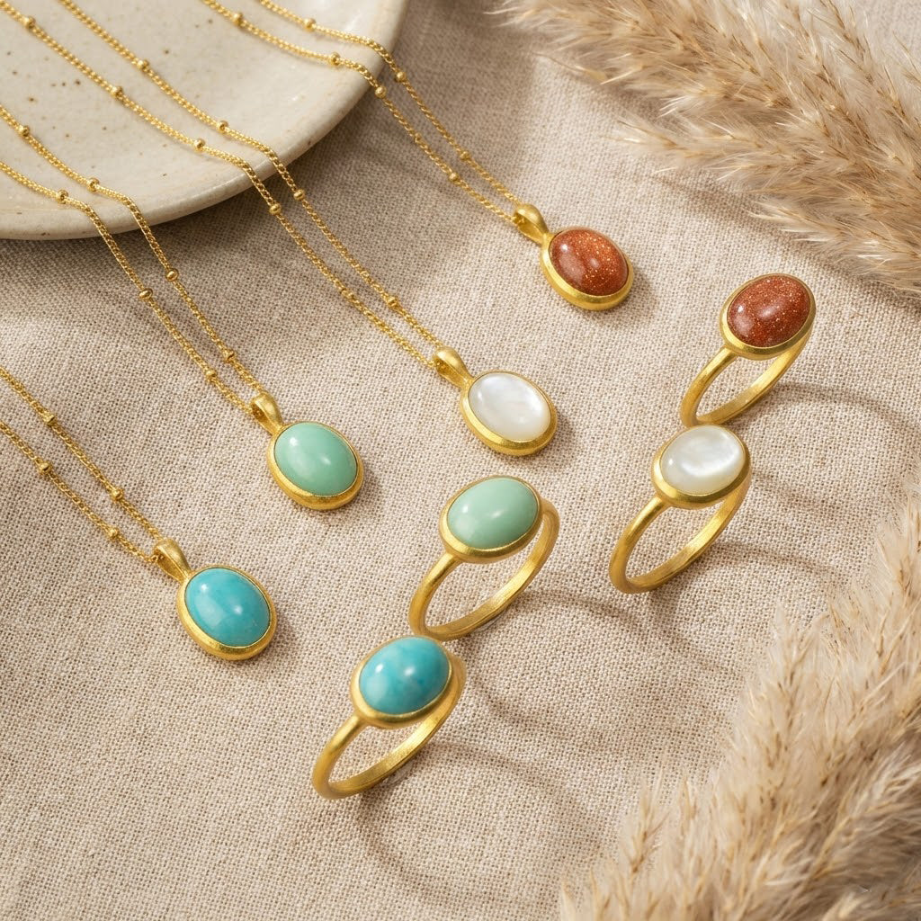 Product-only image of an oval amazonite ring featuring a smooth cabochon turquoise stone set in a minimalist gold band. Handmade gemstone ring designed for everyday wear, stacking, or wearing alone as a statement piece.