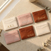 Personalized PU leather card holders in pink, brown, and white with different engraving examples and color options.
