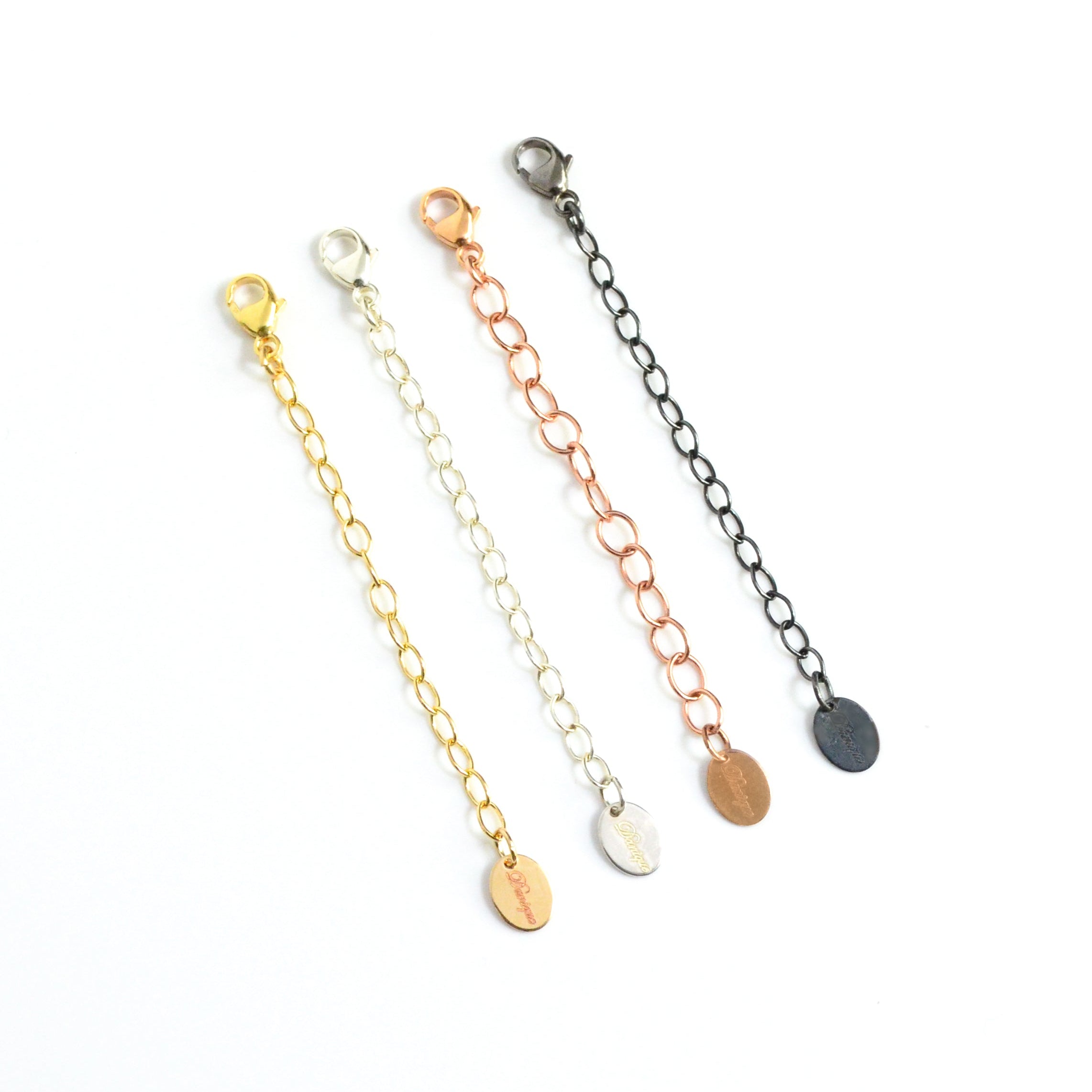 Set of necklace extenders in gold, silver, and rose gold with lobster clasps, ideal for layering or adjusting necklace length. Adjustable chain extension adds versatility to jewelry collection, ensuring a comfortable fit for every outfit. Jewelry accessory gift idea for birthdays, bridesmaids, or everyday wear.