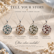 Constellation Orb drop earrings with silver tone openwork spheres and aqua accents on gray stone

