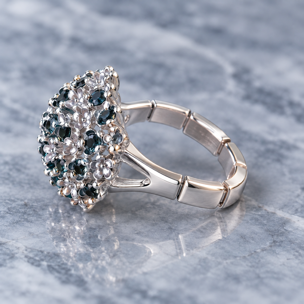 Constellation Orb cocktail adjustable ring with sculptural openwork sphere and aqua accents 
