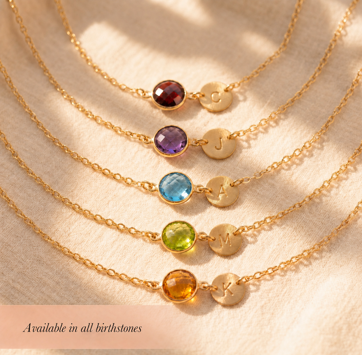 Personalized birthstone jewelry shown with multiple gemstone color options for custom necklaces and bracelets