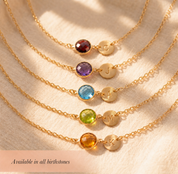 Personalized birthstone jewelry shown with multiple gemstone color options for custom necklaces and bracelets