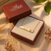 Danique Jewelry gift box with engraved clear quartz bar necklace