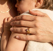 Mom wearing cluster custom birthstone ring gold minimalist jewelry