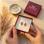 Custom family birthstone earrings presented in Danique Jewelry gift packaging for mom, grandma or her