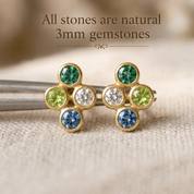 Close-up of natural 3mm gemstones in custom four birthstone stud earrings available in silver and gold vermeil