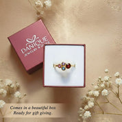 Personalized birthstone mom ring presented in Danique Jewelry gift box, ready-to-gift family birthstone jewelry for mothers and grandmas, custom mother ring with children’s birthstones, meaningful keepsake gift for Mother’s Day, birthday, or new mom, handcrafted minimalist birthstone ring inspired by April diamond quartz and October opal, elegant family jewelry packaging