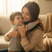 mother wearing custom birthstone ring for mom of three while holding her child, meaningful family jewelry with three colorful gemstones symbolizing children, elegant gold vermeil band designed for moms who love sentimental keepsakes, perfect gift for Mother’s Day, birthdays, Christmas or new moms, personalized family ring crafted with dainty cluster gemstone design and high-quality materials for everyday wear