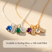 Personalized birthstone name necklaces shown in sterling silver and yellow gold with colorful oval gemstones.
