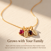 Personalized family birthstone necklace with kids name charms showing additional charms can be added later.
