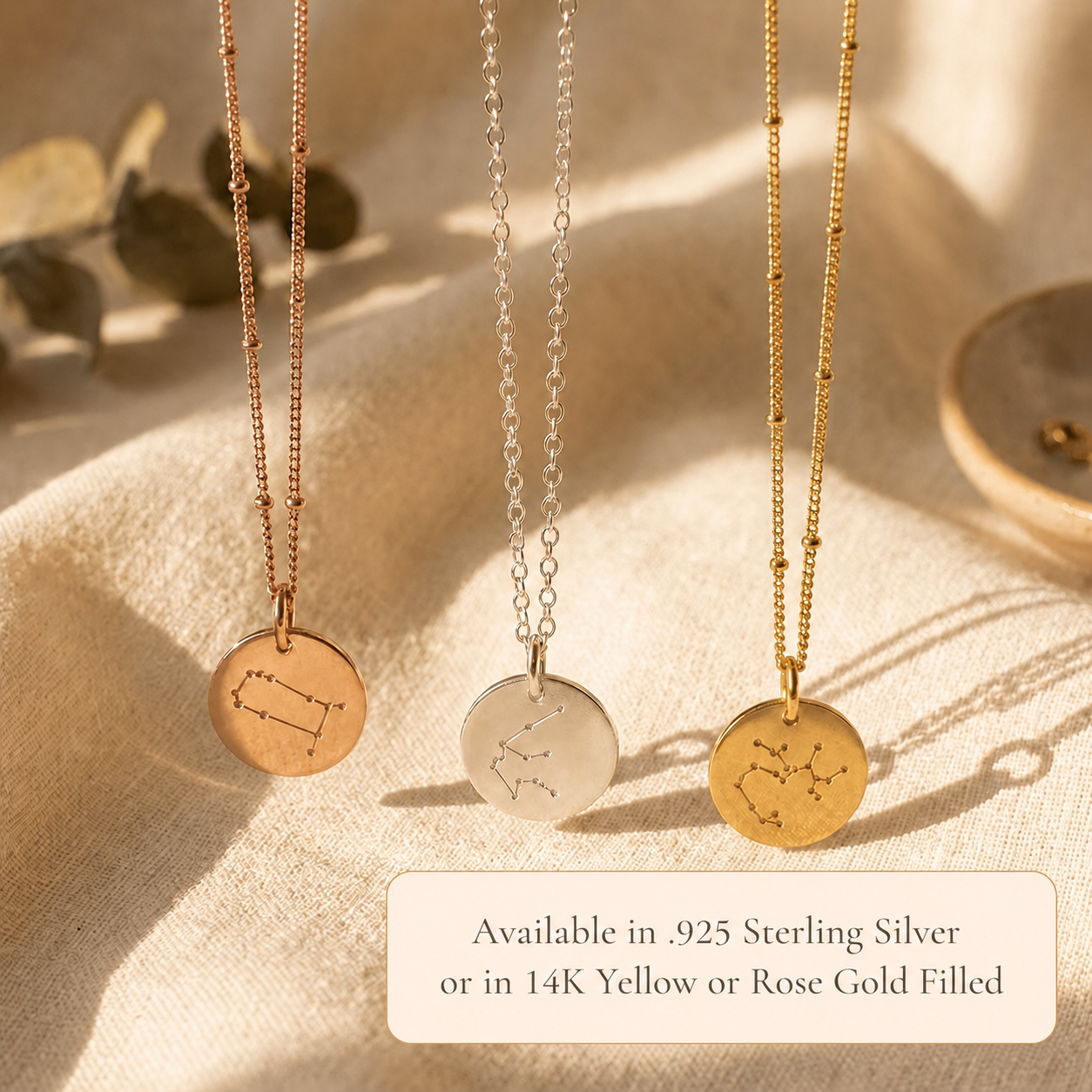 Zodiac disc necklaces available in silver, yellow gold, and rose gold with constellation designs.