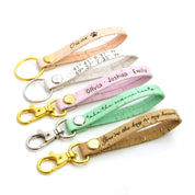 Portuguese cork keychain options with silver and gold rings and lobster clasps. Celebrate with engraved coordinates, names and handwriting.