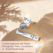 Personalized silver cufflinks and matching tie clip engraved with the monogram "EFM," displayed on a warm, golden fabric background with sunlight and shadows. This custom men’s accessory set can be engraved with names, monograms, initials, dates, coordinates, or actual handwriting for a meaningful and unique touch. Perfect gift for weddings, groomsmen, anniversaries, Father’s Day, graduations, retirements, and other milestone celebrations.