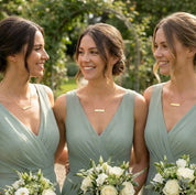 Bridesmaids wearing matching minimalist gold bar necklaces, personalized engraved jewelry perfect for bridesmaid gifts, wedding jewelry and custom name necklace.