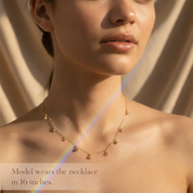 Model wearing dainty birthstone necklace — personalized gemstone necklace for moms with 16-inch chain
