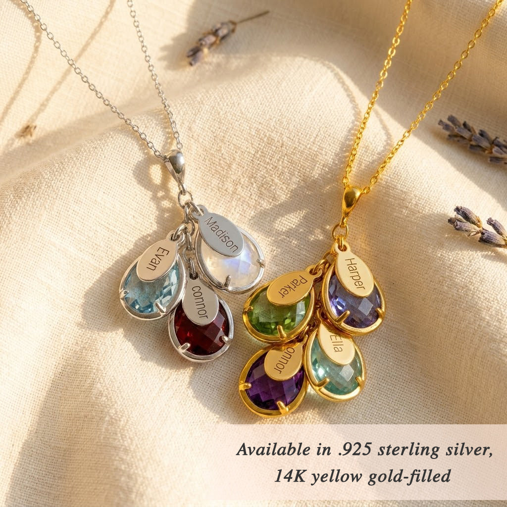 Three personalized birthstone necklaces with teardrop crystal charms and engraved oval name tags shown in gold and sterling silver finishes. Family necklace can be customized with children’s names and months, featuring satellite or cable chains in .925 sterling silver or 14k gold-filled, hypoallergenic and nickel-free. A meaningful mom gift for birthdays, Mother’s Day, or Christmas, designed for everyday wear and layering with multiple stones to represent loved ones.