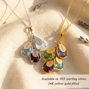 Three personalized birthstone necklaces with teardrop crystal charms and engraved oval name tags shown in gold and sterling silver finishes. Family necklace can be customized with children’s names and months, featuring satellite or cable chains in .925 sterling silver or 14k gold-filled, hypoallergenic and nickel-free. A meaningful mom gift for birthdays, Mother’s Day, or Christmas, designed for everyday wear and layering with multiple stones to represent loved ones.