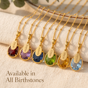 Personalized birthstone name necklaces available in all birthstones with engraved oval charms and gold chains