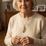 Grandmother wearing custom birthstone necklace with names and gemstones for grandchildren, meaningful family jewelry gift for grandma, personalized generational necklace