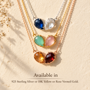 Two birthstone necklaces shown in sterling silver, yellow gold and rose gold vermeil with colorful teardrop gemstones.