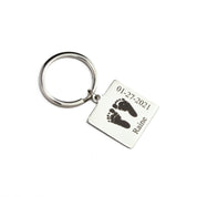 Square Shape Stainless Steel Keychain for Dad or Grandpa Personalized with Baby Hand Engraving, Baby Name, and Baby Birthdate resting on a white background
