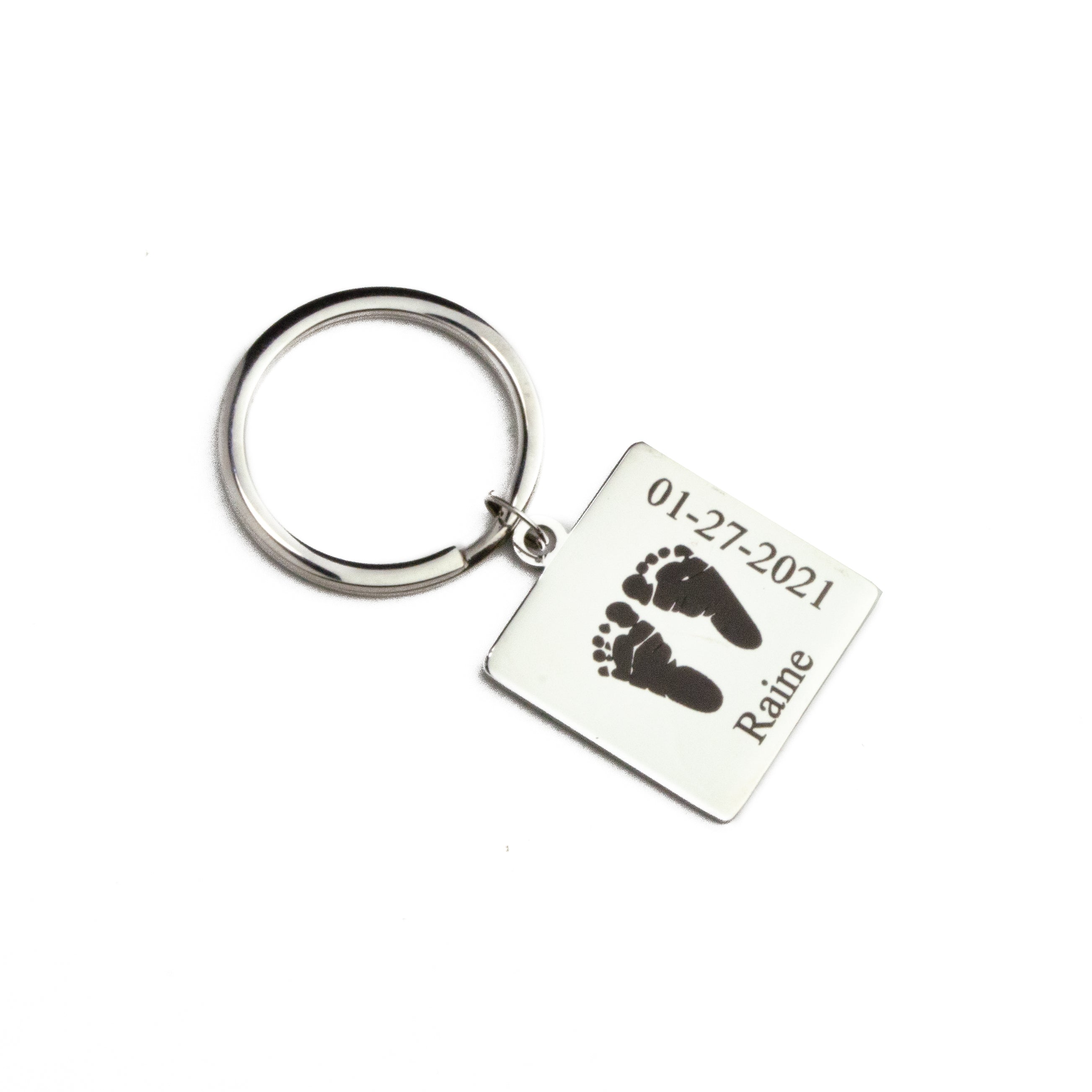Square Shape Stainless Steel Keychain for Dad or Grandpa Personalized with Baby Hand Engraving, Baby Name, and Baby Birthdate resting on a white background