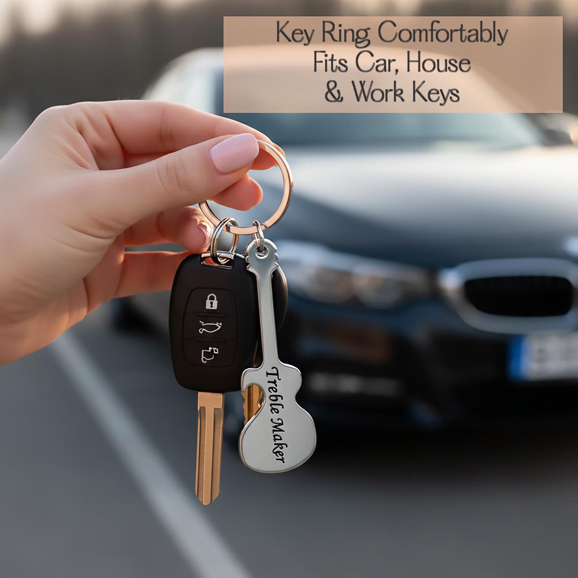 Personalized guitar bottle opener keychain attached to car keys. Durable stainless steel engraved keychain for everyday carry.