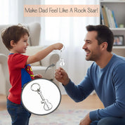Child giving a personalized guitar bottle opener keychain to dad. Meaningful engraved keychain gift for music-loving dads and guitar players.
