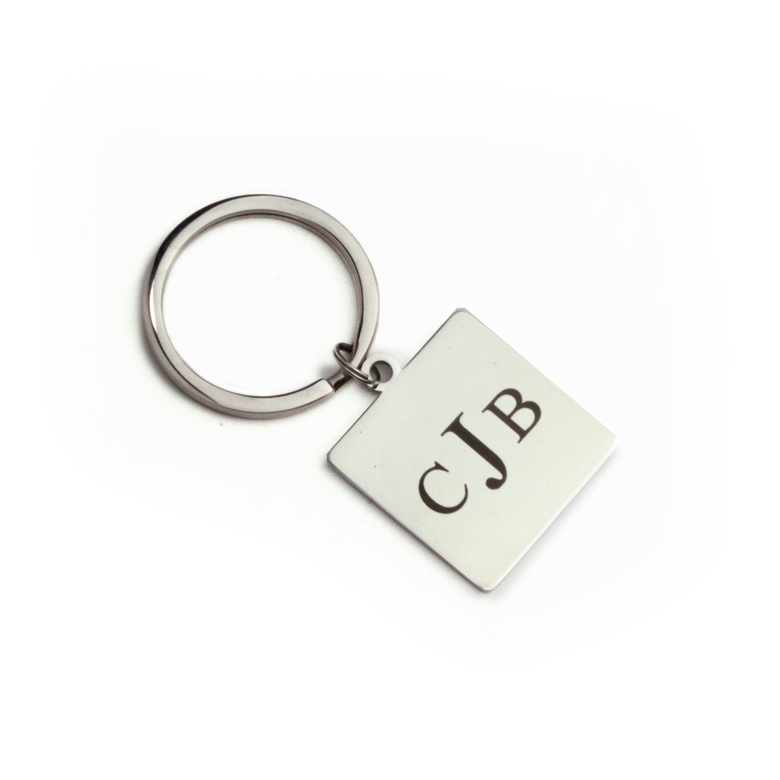 Silver Stainless Steel Square Shape Keychain Engraved with a rounded Custom Monogram. Personalize a keychain with a custom monogram, custom text, or custom image such as baby handprints or a child's drawing.