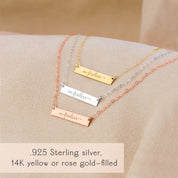 Layered “fearless” bar necklaces in sterling silver, yellow gold filled and rose gold filled displayed on a soft blush background. Dainty inspirational word necklaces with engraved arrow detail, perfect minimalist layering jewelry and motivational gift for friend, daughter or graduate.