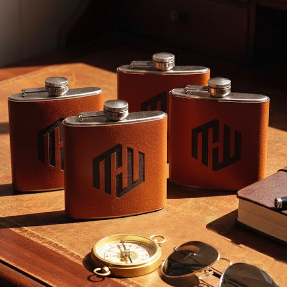 Collage of leather flasks in several colors engraved with different monograms and names, showing variety of personalization styles for custom hip flasks, ideal for groomsmen proposal gifts, bachelor party favors or Father’s Day present
