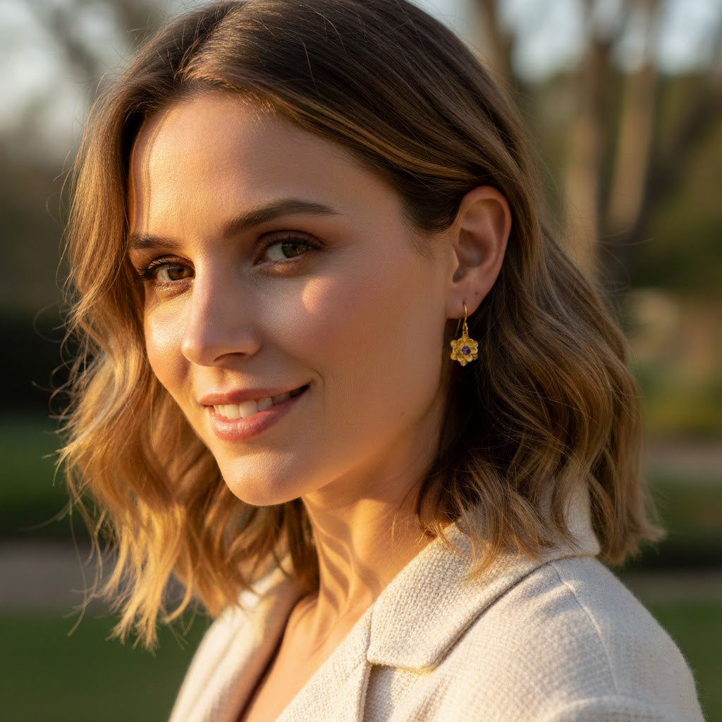 Personalized bloom birthstone earrings worn on model, dainty floral jewelry with custom birth month gemstone perfect for everyday wear