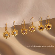 All birthstone options for custom flower earrings shown together, personalized floral jewelry available in every birth month