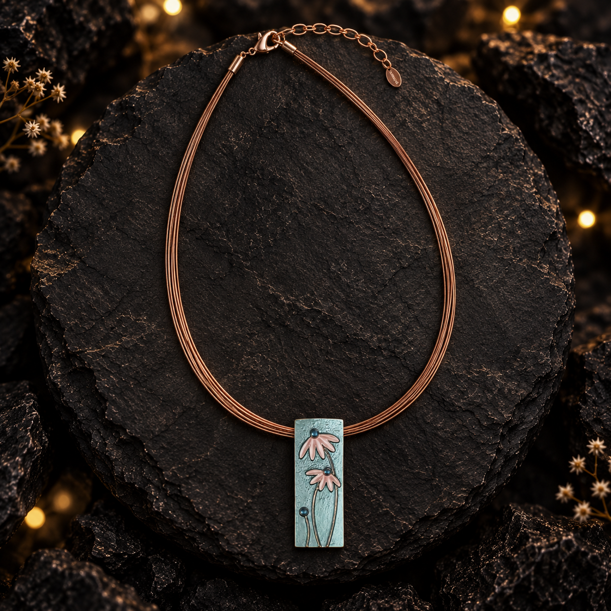 Full boho rectangular flower pendant necklace displayed on dark textured background