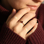 garnet stacking ring worn on hand minimalist red stone ring