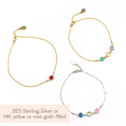 Side-by-side custom birthstone anklets in sterling silver and gold filled, each featuring colorful gemstones. Perfect as a personalized gift for moms, grandmothers, or matching sister/friendship anklets. Handmade in the USA with adjustable or fixed clasp lengths, this jewelry piece is a sentimental keepsake for Mother’s Day, Christmas, anniversaries, or birthdays.