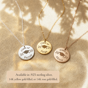 Gold, silver, and rose gold graduation disc necklaces engraved with Class of 2026, names, and graduation cap details.
