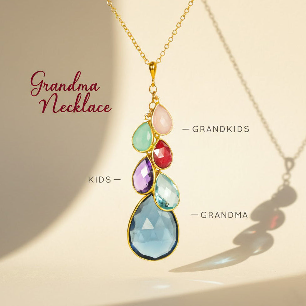 Personalized grandma necklace with birthstones in a family tree–inspired cascade teardrop design, handcrafted in sterling silver or gold vermeil. Each gemstone represents children and grandchildren, making this a meaningful grandmother birthstone necklace and perfect family tree jewelry gift for Mother’s Day or new moms.