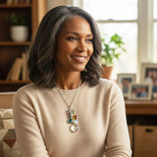 ustom birthstone grandma necklace worn by woman, cascading family birthstone pendant with stones representing children and grandchildren, personalized grandmother jewelry gift, meaningful family birthstone necklace for grandma, mothers day or birthday gift for grandmother