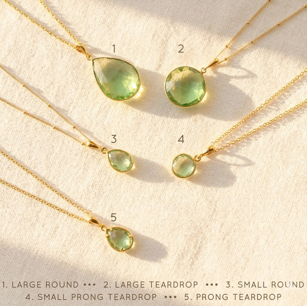 three green amethyst necklaces with different pendant sizes, layered gemstone necklace set in gold