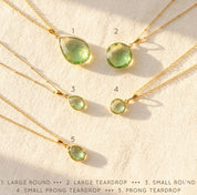 three green amethyst necklaces with different pendant sizes, layered gemstone necklace set in gold